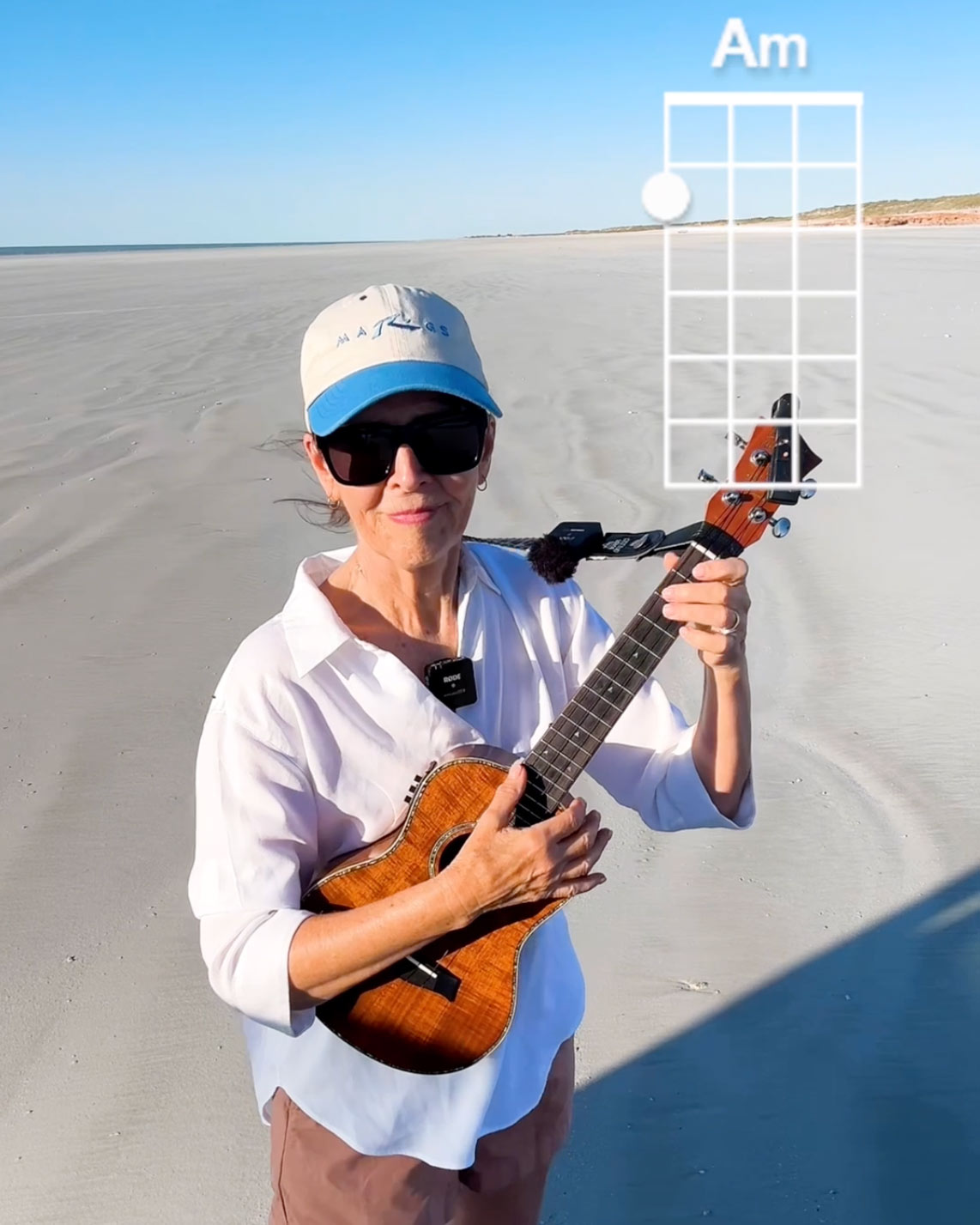 Ukulele tutorial on the beach